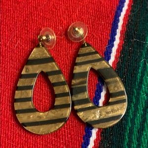 Earrings looks great with leopard print clothing